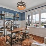 living room with blue paneling